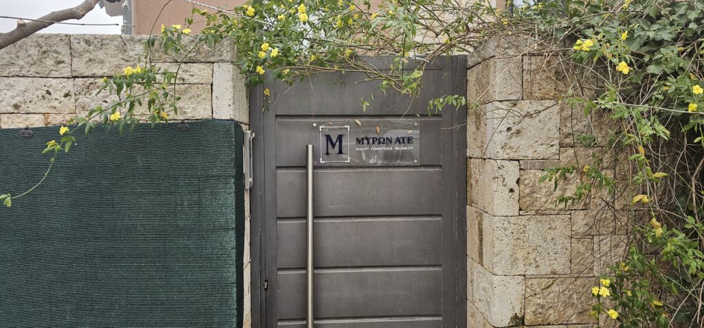 A picture showing a door with the MironATE logo on it.